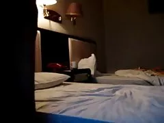 Čínske amatérsky pár v hoteli